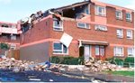 The aftermath of a 1988 IRA bomb attack in the Creggan Estate, Derry/Londonderry 